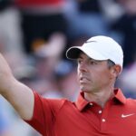 The Open 2025 Live: Leaderboard and Golf with Rory Mcilroy in competition as John Perry in a hole in a